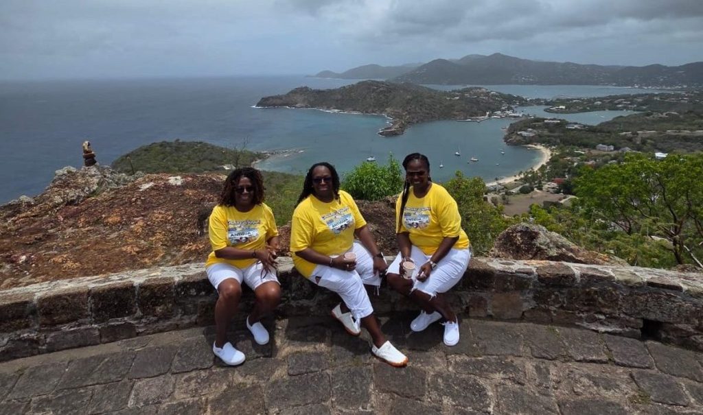 Guests enjoying scenic views at Shirley Heights Lookout Antigua.